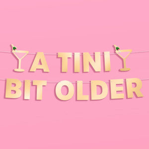 Tini Bit Older Banner - gold foil banner