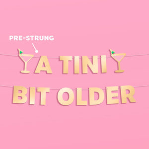 Tini Bit Older Banner - gold foil banner